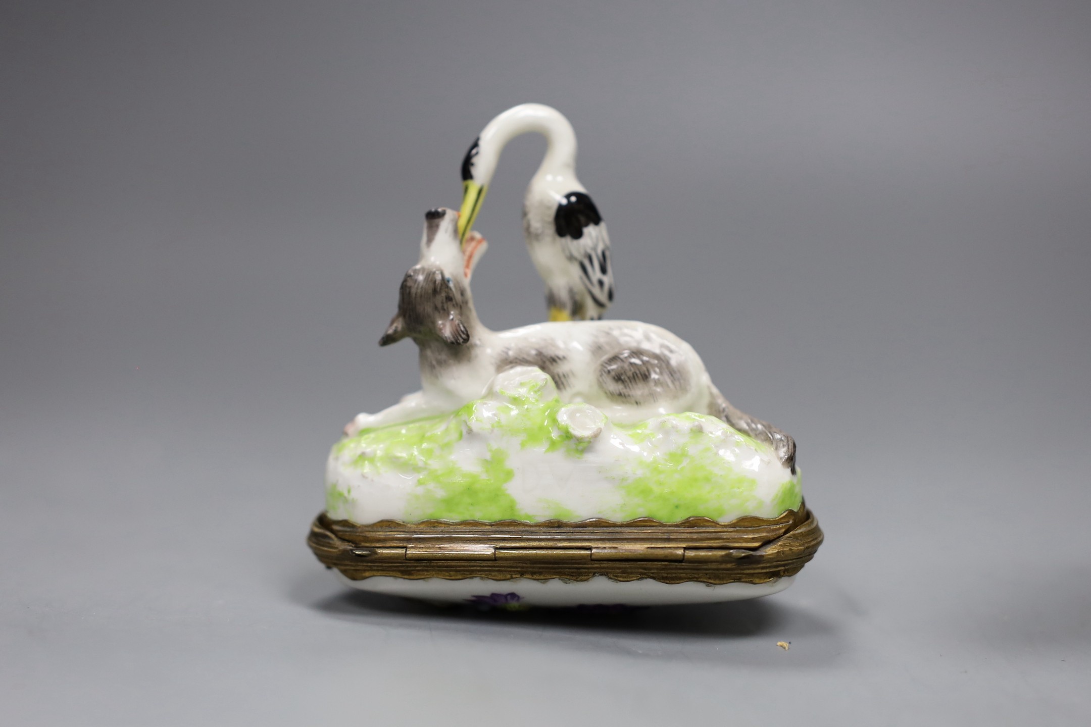 Two Continental porcelain snuff boxes circa 1900, one a novelty Aesop fable design, height 9cms